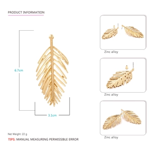Golden leaf drop earrings in zinc alloy, dimensions 6.7cm by 3.1cm with detailed views