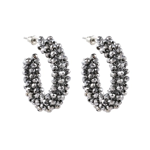 Bohemian silver-grey multi-faceted crystal bead C-shaped hoop earrings on white background