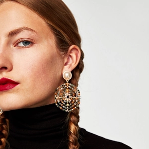 Chic gold-plated mesh drop earrings with colorful rhinestones and pearl stud on model