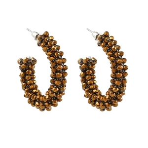 Bohemian C-shaped hoop earrings with metallic bronze faceted beads in a vintage style