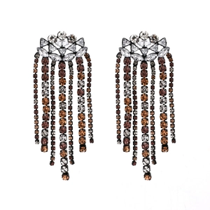 Dramatic rhinestone tassel earrings featuring amber crystal drops in a bohemian style