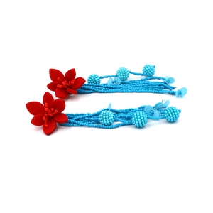 Long beaded tassel earrings with red fabric flowers and blue beads for ethnic style