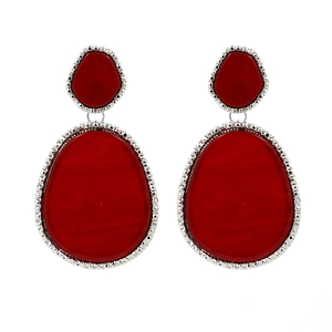 Detail view of red marbled acrylic teardrop earrings with beaded silver metal frame