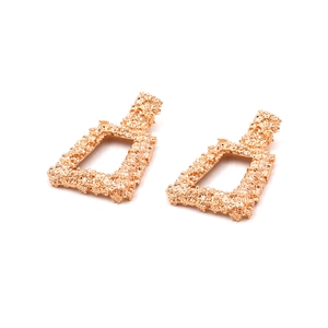 Exaggerated geometric square drop earrings with gold textured lava finish for women