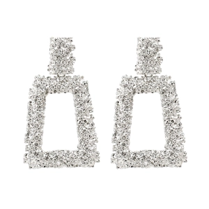 Chunky silver geometric hollow earrings with textured lava pattern in rectangle shape