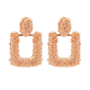 Rose gold geometric textured earrings with a hollow rectangular drop design