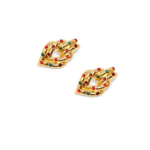 Baroque style gold twisted earrings with red and green gemstones on white background