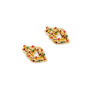 Detail of vintage gold textured earrings with red and green round gemstone inlays