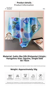 Close-up of lemon and berry print silk-feel polyester scarf showing satin texture