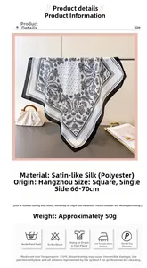 Detailed view of paisley silk scarf with black and white patterns and size parameters