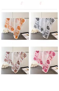 Vier-Farben-Display von Seidenschals mit Blumenmuster in Orange Weiß Braun und Rosa