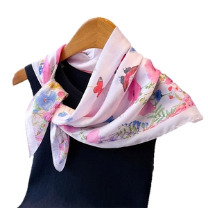 Floral butterfly print silk scarf in soft pink featuring elegant botanical patterns