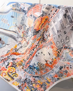Detail of silk-like scarf featuring classical European architecture and hot air balloon prints