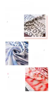 Detailed view of animal print silk scarf featuring leopard and wave patterns with fine stitching