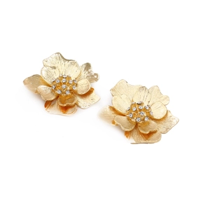 Vintage oversized gold flower earrings with crystal center and textured metal petals
