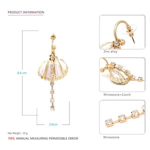 Détail des boucles d'oreilles coquillage rose avec dimensions 6,6x2,6cm et alliage de zinc