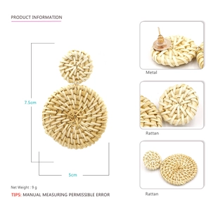 Detail view of bohemian handmade rattan hoop earrings with metal posts and dimensions