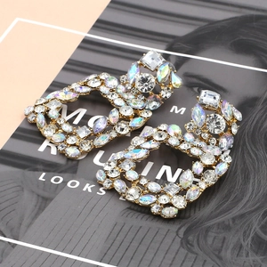 Dramatic hollow gold alloy earrings featuring colorful AB crystals and sparkling rhinestones