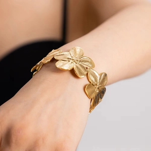 18K gold plated butterfly flower open bangle bracelet with textured petal details