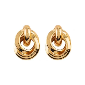 Minimalist geometric interlocking gold circle earrings in a layered sphere design