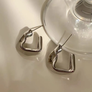 Modern irregular twisted geometric silver earrings made of S925 sterling silver