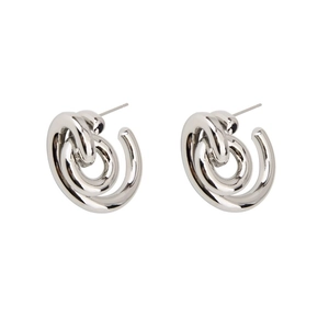 Detailed view of silver S925 geometric spiral twist earrings with multilayer design