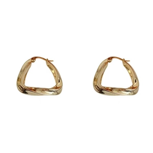 Polished gold geometric irregular triangle earrings for women with minimalist metallic style