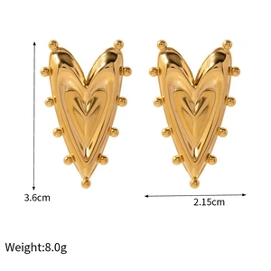 Detail view of gold heart earrings with dimensions 3.6cm by 2.15cm and 8.0g weight