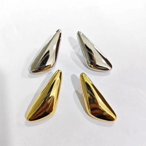 Polished 18K gold and silver waterdrop earrings with geometric streamlined design