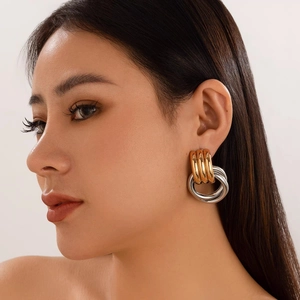Exaggerated geometric layered hoop earrings in gold and silver mixed metal finish