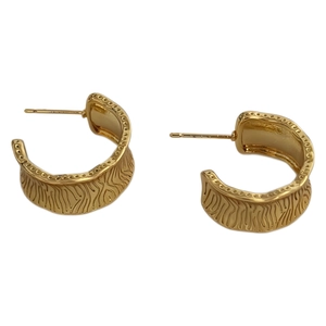 Chic 18K gold plated C-shaped earrings with unique wavy texture on white background
