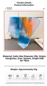 Detail eines Seidenschals mit blau-orangefarbenem Farbverlauf und abstraktem Malerei-Design