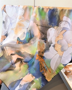 Detailed view of the lotus and dragonfly print on high-quality satin silk scarf
