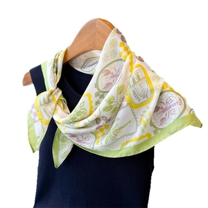 Elegant square silk scarf with lobster and sardine print on a yellow and green background