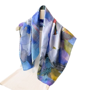 Elegant ice blue silk scarf featuring artistic dragonfly and floral watercolor patterns
