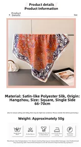 Detail view of 70cm paisley silk satin scarf with vibrant orange and purple color blocking