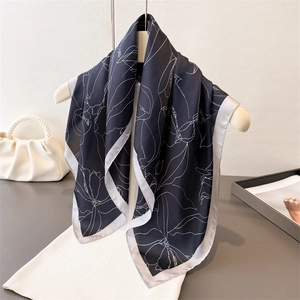 Elegant floral silk satin scarf in navy blue with white line art and grey border detail