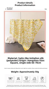 Detail view of leopard print satin scarf showing 70cm dimensions and washing care icons