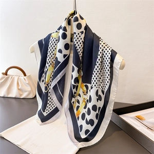 Polka dot and gold chain print silk scarf in black white and yellow color block