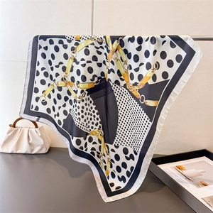 Polished faux silk square scarf featuring classic polka dots and gold chain pattern