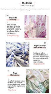 Detail view of the elegant printed silk-like scarf with smooth texture and fine edges