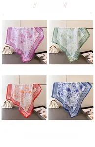 Detailed color selection showing elegant floral silk scarves in pink green red and navy