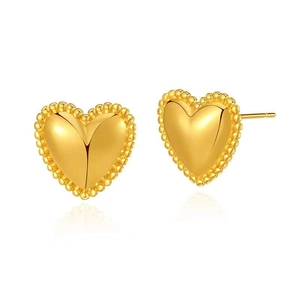 Vintage 18K gold plated brass heart stud earrings with beaded edge on white background