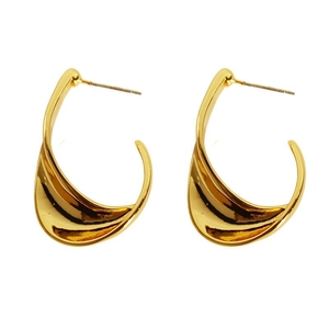 Minimalist gold irregular twisted geometric earrings with a polished mirror finish