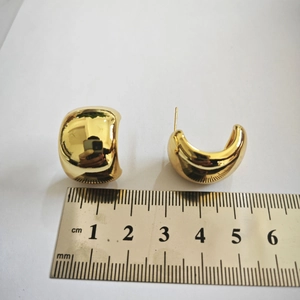 Polished chunky gold hoop earrings with mirror finish, 1.8cm width on white background