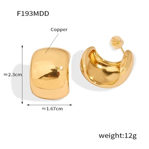 Polished thick gold-plated copper C-shape earrings featuring a minimalist geometric design