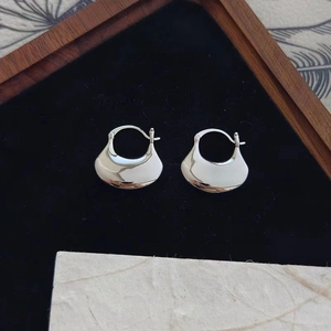 Minimalist 925 sterling silver handbag-style hoop earrings with a mirror polished finish