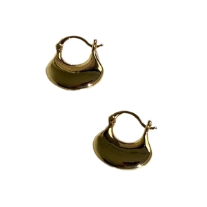 Minimalist thick gold hoop earrings with polished crescent design for modern fashion