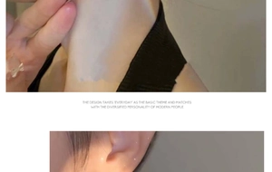Close-up of minimalist large metal hoop earring worn by a model in modern style