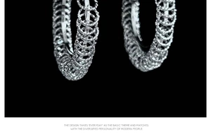 Macro view of silver hoop earrings featuring intricate woven mesh metal texture